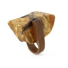 a wooden ring with a piece of wood on it