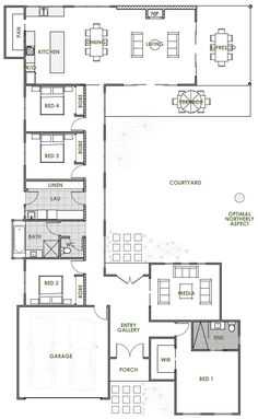 the floor plan for a two story house with an attached garage and living room area