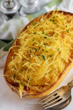 a baked potato dish with cheese and herbs