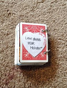 a playing card with the words love always 10 year marriage written on it in red and white