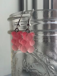 Sugar-coated gummy bear earrings. Lightweight and super cute.  Choose from 10 different color options and 2 different ear wire materials: stainless steel and sterling silver. Prices will vary depending on the material.  Handmade dangle and drop earrings.  Ships for free!  If your item is somehow damaged in shipping, don't hesitate to reach out to me. I will replace it immediately! It will differ slightly from the picture since my products are handmade, but I will make it as close as possible to Bears Cute, Gummy Bear Earrings, Candy Earrings, Bear Earrings, Cute Candy, Earring Holder, Gummy Bear, Earrings Cute, Silver Prices