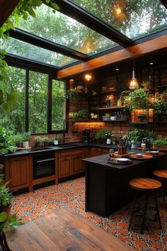 a kitchen filled with lots of wooden furniture and plants