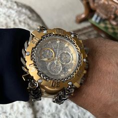 This Invicta Watch From The Gladiator Collection Holds A Quartz Movement As Well As 2.9232 Carats Of Diamonds, And It Features A Sturdy Gold, Steel Case. On Its Face You Can Find A Silver, Gold Metal, Pave Dial Covered By A Durable Flame Fusion Crystal. This Style Is Finished By A Reliable Gold, Silver Stainless Steel Band, And It Offers 200m Water Resistance. Bringing The Spirit Of Hercules Into The Realm Of Mankind, The Invicta Gladiator Reserve Collection Is Clad With The Armor And Skill To C Luxury Gold Stainless Steel Chronograph Watch, Designer Silver Chronograph Watch, Designer Silver Chronograph Watch With Chronometer, Designer Silver Chronograph Automatic Watch, Designer Silver Automatic Chronograph Watch, Designer Gold Chronograph Watch, Luxury Silver Chronograph Watch With Skeleton Dial, Luxury Automatic Stainless Steel Chronograph Watch, Luxury Stainless Steel Automatic Chronograph Watch