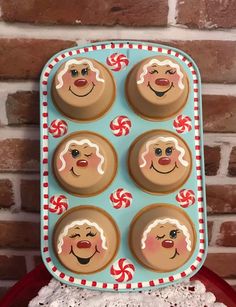 an image of some cupcakes with faces on them in the shape of santa claus