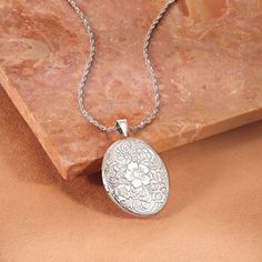 Ross-Simons - Monogram - Sterling Silver Floral Locket Necklace. Etched with a scrolling floral motif, our sterling silver oval locket has the aura of a vintage-style keepsake. Can be engraved on the back for FREE with a monogram in your choice of block or script type. Suspends from a Singapore chain that adjusts from 24" to choker length. Lobster clasp, sterling silver personalized locket necklace. Medallion Jewelry Hallmark Keepsake, Hallmarked Medallion Jewelry For Keepsake, Keepsake Medallion Jewelry With Hallmark, Ornate Silver Jewelry With Engraving Option, Elegant Medallion Locket Necklace With Hallmark, Silver Oval Pendant Jewelry With Engraving Option, Silver Jewelry With Engraving Option, Oval Pendant, Elegant Etched Oval Pendant Locket Necklace, Oval Locket Necklace With Intricate Design For Anniversary