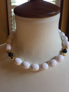 "This listing is for a Monet white barrel beaded choker with gold and blue accent beads. This Choker measures 14\" in length. The beads are in fantastic condition. The shipping weight will be 2 ounces." White Choker With Large Round Beads, 1940s Engagement Ring, Blue Accent, Gold And Blue, Chunky Jewelry, Art Deco Diamond, Choker Necklaces, Blue Accents, Beaded Choker