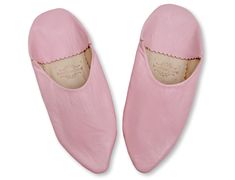 These cool, trendy and super comfy pointed babouche slippers in light pink leather are natural, breathable, will mould themselves to the shape of your feet and are perfect for relaxing in the mornings and evenings after a hard days work! The ideal gift, and of course, the ultimate work from home footware! Our babouches are made using soft supple organic sheeps leather which has been processed naturally without the use of nasty chemicals such as chromium. The leather is hand dyed in our bespoke range of colours and our babouche maker handmakes the babouche with a skill that is passed down from generation to generation, keeping the traditional artisanal craft alive. As these babouche are handmade they may have some imperfections making them imperfectly perfect!    The soles are made from sof Pink Spring Mules With Rubber Sole, Spring Pink Mules With Rubber Sole, Pink Leather Slip-on Mules, Pink Leather Casual Slippers, Casual Pink Leather Slippers, Pink Slip-on Slippers With Soft Sole, Pink Soft Sole Slip-on Slippers, Pink Closed Toe Slippers For Spring, Pink Mules With Leather Sole For Spring