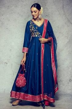 This beautiful Blue silk Anarkali Gown has stunning  embroidery and beautiful gota patti border over the hem line and borders of the dupatta  ✨This outfit is perfect of any festive party, wedding function  ✨If you want any changes in the outfit please contact us. This dress can be customise in any other colour and in all size.We will make this dress as per your choice. ✨There may be slight colour difference due to high quality camera resolution and other filters. Care Instructions  Dry clean onl Royal Blue Anarkali, Gown Traditional, Silk Anarkali Gown, Anarkali Churidar, Silk Anarkali Suits, Suit Indian, Blue Anarkali, Silk Anarkali, Potli Bag