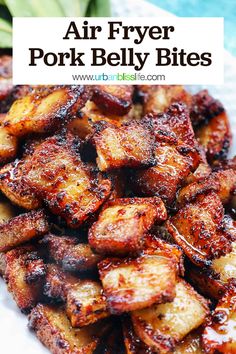 air fryer pork belly bites on a white plate