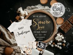 a baby announcement with cookies, marshmallows and other items