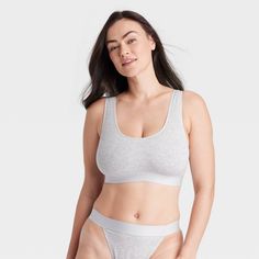 Stay comfortable and stylish at home or when running errands in this Cotton Stretch Unlined Scoop Bralette from Auden™. The jersey pullover bralette is made of a cotton-blend fabric with added spandex for a flexible fit that moves with you, while the full lining provides extra coverage. The fashionably simple bralette features wireless unlined cups for added comfort and a sleek, smooth look. Auden™: Fit for you in every way. Everyday Cotton Bra, Basic Cotton Crop Top, Bra Friendly, Casual Cotton Bra For Loungewear, Seamless Cotton Crop Top For Everyday, Seamless Cotton Bra, Everyday Seamless Cotton Crop Top, Cotton Sports Bra With Light Support For Loungewear, Casual Cotton Seamless Bra, Everyday Sporty Cotton Bra