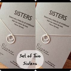 two sisters necklaces on cards with the words set of two sisters attached to them