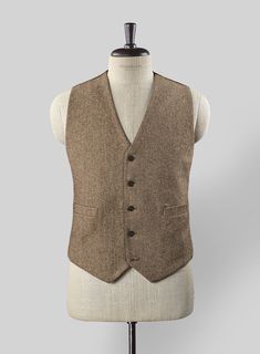 The Irish Brown Herringbone Tweed Waist Coat will become the standard of business dressing and by far the most ubiquitous option. Crafted from wool, the Irish Brown color of the waist coat will surely influence a veteran dresser to buy the waist coat for building a sharp wardrobe.    Look Includes    Irish     Brown     Herringbone     Tweed  Fabric  Classic Vest    Click 'Customize Now' to modify the look if needed.  
  Lining: Viscose; Dry Clean. Tailored Single-breasted Tweed Vest, Single Breasted Tweed Vest For Workwear, Classic Tweed Vest For Work, Fitted Single-breasted Tweed Vest, Wool Business Vest For Fall, Wool Vest For Business In Fall, Tailored Tweed Vest For Formal Occasions, Formal Tailored Tweed Vest, Winter Business Tweed Vest