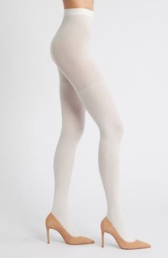 Soft ribbing brings understated texture to stretchy tights topped with a soaring waistband. Nylon/spandex Hand wash, line dry Imported White Micro-elastic Tights, White Seamless 4-way Stretch Bottoms, Seamless White Bottoms With 4-way Stretch, Stretch Full Length Elastane Legwear, Stretch Full-length Elastane Legwear, Stretch Elastane Legwear, Compressive Thigh High Elastane Hosiery, Stretch Elastane Thigh-high Hosiery, Stretch Thigh-high Elastane Hosiery