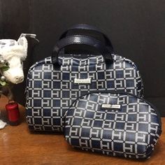 This Is For Tommy Hilfiger Make Up Bag. In A Royal Blue, Black And White, Blue Handles, Fake Leather. Very Nice And Thick Materials. Includes Matching Travel Or Purse Make Up Bag. Both Have A Silver Name On The Outside And A Red Leather Label On Inside. Excellent Brand New Condition. Lg Bag Is 10.5” X 7.5” & Small Bag Is 7”X5.5”. They’ve Been Cleaned And Are Ready To Be Used. Bundle Two Or More Items And Get 10% Off . Plus Save On Shipping For All Items Up To 5 Pounds, You Only Have One Shipping Tommy Hilfiger Bags, Leather Label, 5 Pounds, Make Up Bag, Small Bag, Red Leather, Mini Bag, Makeup Bag, White Blue