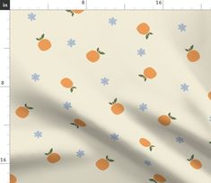 an orange and blue pattern on a white background, with small flowers in the center