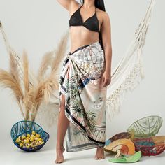 This flirty, flowy sarong comes in a unique nature-inspired print on satin. With its flowy texture and breezy material, it creates a feminine shape while still maintaining comfort and ease to wear. Primed for in between dips in the pool and lunch breaks to be wrapped around your hips as a skirt, tying it as a dress or draping it over your shoulders. Hand wash or delicate machine wash (cold) with gentle detergent Wrinkle-free fabric 100% Satin Bohemian Silk Sarong, Multicolor Silk Sarong For Beach, Bohemian Multicolor Silk Sarong, Silk Sarong For Beach Spring Season, Silk Sarong For Beach, Elegant Silk Sarong For Beach, Summer Beach Silk Scarf, Chic Summer Beach Silk Scarf, Chic Summer Silk Scarf For Beach