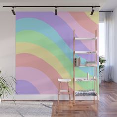 a room with a large wall mural in the shape of a sunburst on it