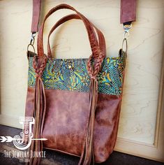 Embossed Leather Handbag - Buy This Boho Purse| The Jewelry Junkie Turquoise Hand Tooled Shoulder Bag For Everyday Use, Hand Tooled Turquoise Shoulder Bag For Everyday Use, Turquoise Hand Tooled Bags For Everyday Use, Hand Tooled Turquoise Bag For Everyday Use, Turquoise Hand Tooled Everyday Bags, Bohemian Hand-tooled Bags For Everyday Use, Bohemian Hand Tooled Satchel For Travel, Artisan Turquoise Bag For Everyday Use, Bohemian Hand Tooled Crossbody Bags