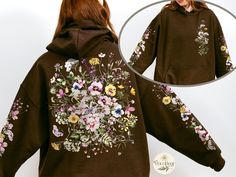 ❤️ Watercolor dried, pressed wildflowers hoodie sweatshirt is a CocoBear original ❤️ Feminine, delicate botanical design featuring spring-blooming violets, buttercups, yarrow, clover, pink baby's breath, and grasses adorns the front, back, and both sleeves. ❤️ Super-soft & cozy with a vintage look and feel. ❤️To ensure sizing, refer to size chart in photos and compare measurements to those of a hoodie sweatshirt you already own that fits well. ❤️ Cotton/poly blend. ❤️ Non-toxic, eco-friendly, wa Pressed Wildflowers, Cottagecore Pastel, Pastel Botanical, Floral Pullover, Boho Cottagecore, Botanical Design, Baby's Breath, Grasses, Pressed Flowers