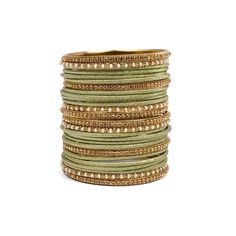 Elevate your upcoming wedding celebrations with our ready-to-wear Mehndi Shimmer Bangle Set. Designed to wear on both hands, this set seamlessly mixes shimmery plain bangles with antique gold accents, perfect styled with your best Indian attire. ABOUT THIS PRODUCT  26 bangles in total antique gold finish bead and champagne crystal bangles shimmer plain bangles sizes available Green Adjustable Cuff Bracelet For Wedding, Traditional Festive Stackable Bracelets, Adjustable Green Cuff Bracelet For Wedding, Festive Traditional Stackable Bracelets, Traditional Festive Stackable Bangle, Festive Bohemian Wedding Cuff Bracelet, Bohemian Bangle For Festive Celebration, Elegant Adjustable Bangle For Diwali, Festive Wedding Bangle Beaded Bracelets