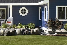 a house with blue siding and white trim