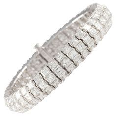 This exquisite custom made link bracelet handcrafted in 18kt white gold features three rows of alternating princess-cut and carre-cut diamonds, H-I color, VS clarity, totaling 126 stones and 23.37 carats. Bling Ideas, Expensive Jewelry Luxury, Princess Cut Diamond, Expensive Jewelry, Stunning Jewellery, Baguette Diamond, Diamond Bracelets, Princess Cut Diamonds, High Jewelry