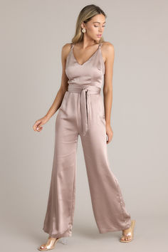 This light mocha satin jumpsuit looks purely divine on you, my elegant friend! If you weren't the official Guest Of Honor when you showed up at the event in this playsuit...you will certainly by the time you leave! This jumpsuit features a v-neckline, crisscross straps on the back that are adjustable, a hidden zipper on the back, and a self tie strap around the waist. Wedding Dress Code Guide, Dress Code Guide, Wedding Guest Dress Ideas, Miami Nights, Wedding Guest Outfit Fall, Dress Code Wedding, Fall Wedding Guest, Satin Jumpsuit, Silk Jumpsuit