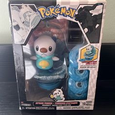 the pokemon figurine is in its box