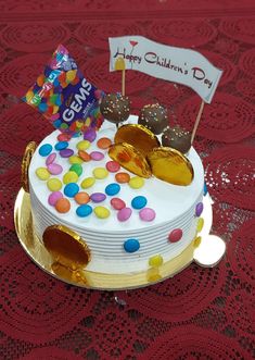 a birthday cake decorated with candy and candies