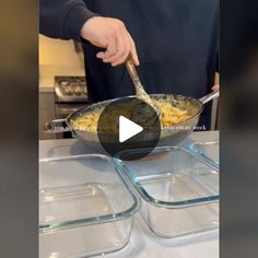 a person is cooking pasta in a pan