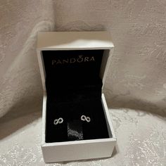 Small Infinity Stud Earrings Made With Sterling Silver Has Cubic Zirconia Jewels Tracing The Earring. Brand New Never Been Worn. Original Pandora Box Included. Pandora Earring, Pandora Earrings Studs, Pandora Pearl, Random Accessories, Earrings Pandora, Girly Bracelets, Antlers Decor, Pandora Rose Gold, Belly Piercing Jewelry