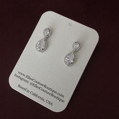 Our Gorgeous Bridal Drop Earrings with Swarovski Crystals are Absolutely Amazing. HOPE Bridal Earrings can be styled with most of our wedding headpieces, Bridal Tiaras and Crowns. ul li { margin-bottom: 0px; } Handcrafted Unique Design Highest Quality & Finest Materials Brilliant SWAROVSKI Crystals Cubic Zirconia Rhodium / Platinum plated gives a luxurious shine and luster. It has a brilliant silver tone and guards against scratches and tarnish. Earrings Drop Length is approx. 1.0 in (2.54 c Pear-shaped Teardrop Earrings With Diamond Accents For Wedding, Pear-shaped Diamond Accented Bridal Earrings, Pear-shaped Bridal Earrings With Diamond Accents, Hand Set Teardrop Chandelier Earrings For Anniversary, Wedding Teardrop Earrings With Diamond Accents, Teardrop Hand Set Chandelier Earrings For Wedding, Pear-shaped Earrings With Diamond Accents For Wedding, Pear-shaped Diamond Accent Earrings For Wedding, Hand-set Teardrop Chandelier Earrings