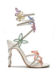 Our "Bitnari - White Multi" sandals are the perfect combination of style and substance. The beautiful butterfly accent that adds just the right touch of whimsy, you'll be soaring through your day in style. Let the butterfly add a unique sparkle to your wardrobe and your step! True to Size for Most Embellished Around the Ankle Strap Heel Hight: 4.25” (approx) Funky High Heels, Butterfly Shoes High Heels, Heels Colorful, Unique High Heels, Funky Heels, Rainbow Heels, Butterfly Heels, Butterfly Shoes, Statement Heels