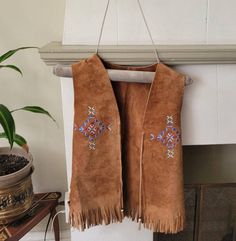 Vintage  brown suede painted vest with  Fringes Excellent condition Festival Fringe Brown Vest, Brown Fringe Vest For Festival, Brown Bohemian Vest With Fringe, Bohemian Brown Vest With Fringe, Brown Bohemian Fringe Vest, Bohemian Brown Fringe Vest, Brown Sleeveless Fringe Vest, Suede Paint, Suede Vest