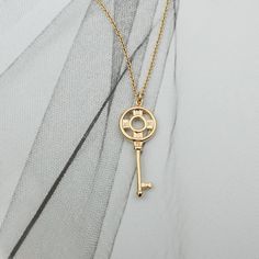 Material : 14k Gold plated - Hypoallergenic over Brass Key : 9.5mm x 27mm