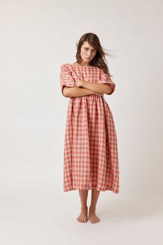 About this product Drop Sleeve Loose Fit Linen Gingham Dress - a perfect blend of comfort and style. This dress showcases a relaxed silhouette with drop sleeves, and side pockets allowing for effortless movement and a laid-back vibe. Crafted from high-quality linen fabric, it offers a soft and breathable feel, ideal for warmer days.The classic gingham pattern adds a touch of timeless charm, making it a versatile choice for various occasions. Dress it up with accessories and wedges for a chic sum Travel Resorts, Drop Sleeve, Gingham Pattern, Hot Iron, Charm Making, Gingham Dress, Persimmon, Puffed Sleeves, Fabric Painting