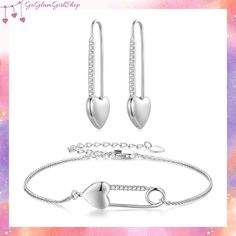 Make a bold statement with our Heart-Shaped Safety Pin Hoop Earrings and Bracelet set. Hand-finished in sterling silver, these pieces are perfect for the fashion-forward and style-savvy. The earrings feature safety pins with heart buttons and encrusted with cubic zirconia stones. The bracelet is adjustable and has a safety pin with a heart-shaped button as its centerpiece, adorned with cubic zirconia stones on one side. The set is a perfect gift for anyone who loves unique and trendy jewelry pieces. Upgrade your accessory collection with this one-of-a-kind set that will leave a lasting impression. 💖 S925 Heart-Shaped Safety Pin Hoop Earrings 💖 Detailed Info: 🔗https://goglamgirl.com/product/heart-shaped-safety-pin-hoop-earrings/ 💖 S925 Heart-Shaped Safety Pin Bracelet 💖 Detailed Info: Sterling Silver Jewelry Sets For Mother's Day, Mother's Day Sterling Silver Jewelry Set, Valentine's Day Sterling Silver Jewelry Sets, Safety Pin Bracelet, Jewelry Box Organizer, Safety Pin Jewelry, Pink Jewelry Box, Bracelet Trendy, Cubic Zirconia Jewelry