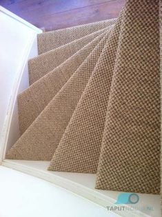 a close up view of some carpeted stairs