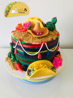 there is a cake that has been decorated to look like a mexican hat and sombrero