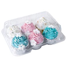 four cupcakes in a plastic container on a white background