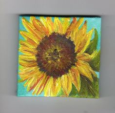 a painting of a sunflower on a blue background