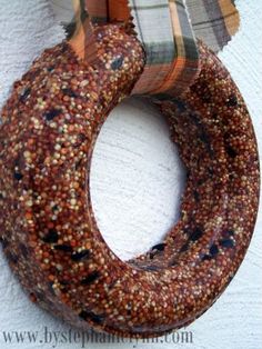 a close up of a wreath hanging on a wall