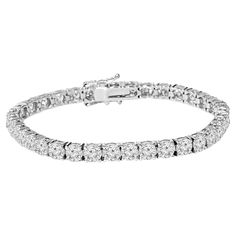 14K White Gold with 2.75TCW Diamond Tennis Bracelet Add a touch of elegance and luxury to your jewelry collection with this stunning 14k white gold bracelet. This bracelet features 92 round brilliant cut diamonds of total carat weight of 2.75 TCW G SI diamonds, making it a truly breathtaking piece. Approximately 7 inches in length "The perfect accessory for any occasion, this timeless piece will add a touch of elegance to any ensemble." Please note, when item is out of stock it takes 2-3 weeks a Diamond Bangles Bracelet, Diamond Tennis Bracelet, White Gold Bracelet, Fine Jewelry Bracelets, Diamond Bangle, Tennis Bracelet Diamond, Diamond Bracelets, Wedding Bracelet, Tennis Bracelet