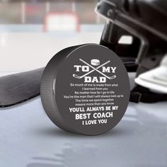 What is the best hockey gift idea for your Dad on his Birthday, Father's Day, Christmas, Thanksgiving, etc? There might be no better gift idea than a Hockey Puck enclosed with a meaningful message for him?This ball is not only something that relates to his hobby, but also is a great keepsake gift that is able to convey the meaning of your love.The ball also comes with a lovely yet meaningful message that you have always wanted to tell him. He might have everything in life but he might have not r Hockey Fathers Day Ideas, Hockey Coach Christmas Gift Ideas, Gifts For Hockey Players, Hockey Puck Crafts, Hockey Christmas, Engraved Hockey Puck, Hockey Gifts, Messages For Him, Hockey Puck