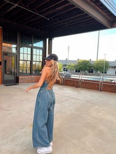 Our favorite jumpsuit! The washed denim look is absolutely amazing paired with the lace-up back! Model is a US size 2 wearing a small. Jeans Jumpsuit Outfit, Denim Western Outfit, Jean Jumpsuit Outfit, Denim Jumpsuit Outfit, Back Model, Country Style Outfits, Western Wear Outfits, Cute Country Outfits, Western Style Outfits