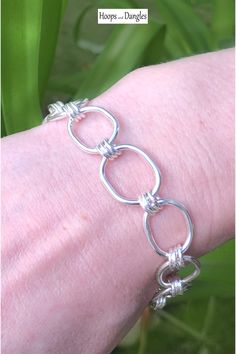 Handmade oblong links are triple linked to add smooth movement. These link chain bracelets fall gracefully around the wrist and hand in sterling silver. Size: Length is 7 1/2" and Width is 1/2" Sterling Silver Paperclip Bracelet With Oval Links, Silver Chain Paperclip Bracelet With Oval Links, Sterling Silver Oval Link Paperclip Bracelet, Adjustable Sterling Silver Bracelet With Oval Links, Nickel Free Sterling Silver Link Bracelet, Sterling Silver Oval Link Chain Bracelet, Nickel-free Sterling Silver Link Bracelet, Sterling Silver Bracelet With Oval Link Paperclip Chain, Sterling Silver Bracelet With Solid Link Construction