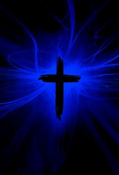 a cross in the middle of a blue background