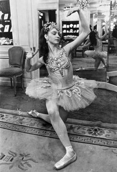 an old photo of a ballerina dancing