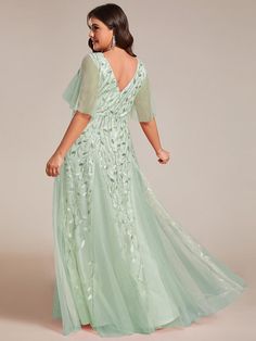 This plus size shimmery maxi long evening gown for weddings features a double deep V neckline and ruffles sleeves. The shimmery leave design gives a romantic vibe. No matter what occasion,?this long formal evening dress with sleeves will make you look gorgeous and elegant. Suitable for evening party, cocktail, weddings, prom, homecoming and graduation!Prices will vary as certain colors of this style is on sale. Sleeveless Fishtail Version: Evening Maxi Dress Short-Sleeve Fishtail Version: Prom Dress Round Neck Chiffon Version: Bridesmaid Dress V Neck Chiffon Version: Party Dress Fit: Please refer to size chart. Closure: It is concealed a zipper up the back. Undergarments: It is not padded, with lining. Fabric: Shell:100%Polyester,Lining:100%Polyester. Stretch: Fabric is no stretch. Plus Size Evening Gown Special Occasions, Plus Prom Dresses, Evening Dress With Sleeves, Leave Design, Ruffles Sleeves, Lace Mesh Dress, Plus Size Evening Gown, Evening Gowns With Sleeves, Poppy Dress